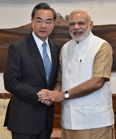 China's foreign Wang Yi with Prime Minister Narendra Modi in New Delhi on 13 August 13